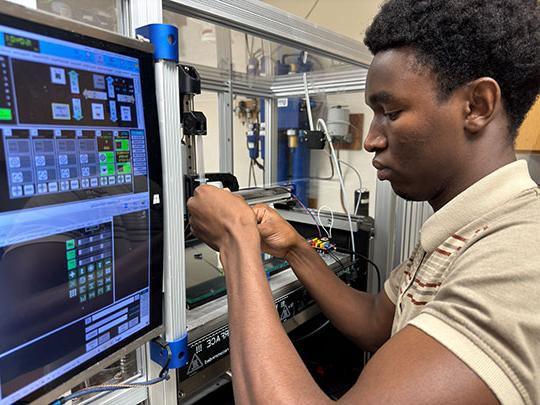 young man working in lab